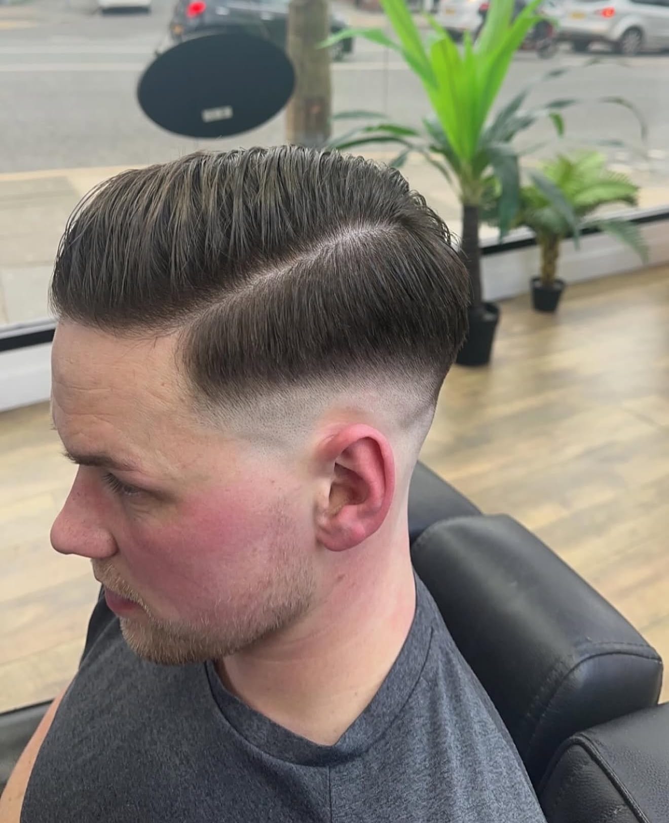 Classic side part with skin fade